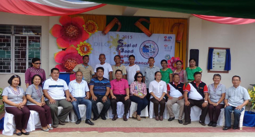 Officials of the municipality of Barugo in Leyte, led by Mayor Alden Avestruz pose for posterity with officials of the Department of Interior and Local Government headed by Director Pedro Noval, Jr. after the town was bestowed of the seal of good local governance on Sept. 8, 2015.  