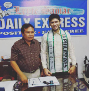 Mister Global Philippines 2015 Rick Kristoffer Palencia, who is from Tacloban City, says the title paved the way for opportunities for him. The 23-year old titlist poses with Leyte Samar Daily Express publisher Dalmacio “Massey” Grafil during his visit on October 1. (Facebook account of Rick Kri)