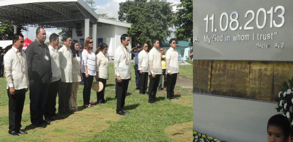 Former Energy Sec. Carlos Jericho “Icot” Petilla, who  served as the keynote speaker  during the 2nd year commemoration of superyphoon Yolanda in Tanauan town, offered wreath on a memorial wall. With him were Leyte Governor Leopoldo Dominico “Mic” Petilla, Vice Governor Carlo Loreto, Tanauan Mayor Pelagio “Pel” Tecson, Vice Mayor Roland Flores and Sanggunian Bayan Members. (Gina P. Gerez)