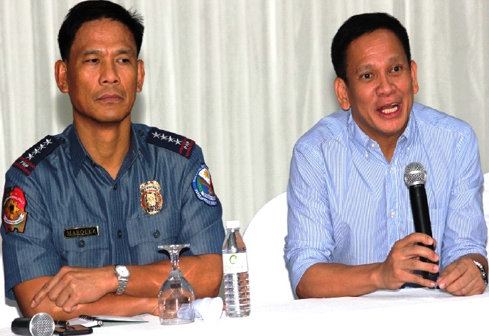 HARD AND HURT. Interior Sec. Mel Senen Sarmiento(right) said that he was hurt as Calbayog being labelled as “killbayog,” prompting the country’s top police cop, Director Gen. Ricardo Marquez, that they would get hard against criminals in the city to ensure a peaceful conduct of election this May 9, 2016. (HENRY PUYAT) 