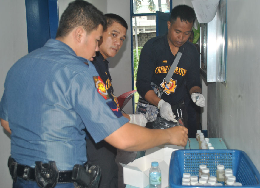 ALL NEGATIVE. Members of the Tacloban City Police Office have their urine samples taken during a mandatory drug test. Based on the results, none of them appeared to have used illegal drugs.(LITO A. BAGUNAS)