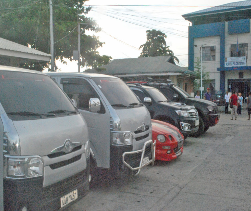 Several luxury vehicles owned by embattled Albuera Mayor Rolando Espinosa were brought to the town police station after these were turned over by the mayor’s aides.(LITO A. BAGUNAS)