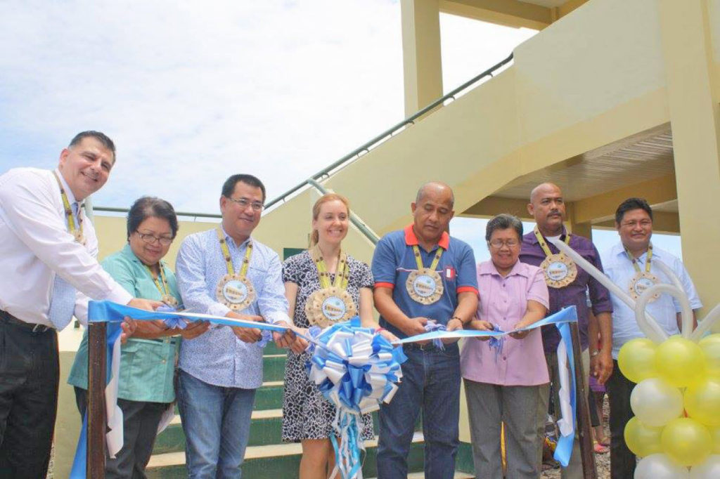 TWENTY-FOUR NEW CLASSROOMS FOR LEYTE. Erica Rounsefell, deputy chief of the United States Agency for International Development(USAID) turned over a seven-classroom building at the Dagami South Central School, one of the four public schools which received new classrooms by the USAID. Joining the ceremony on Sept.7 were Leyte Gov. Leopoldo Dominico Petilla, Mayor Abundio Delosa and provincial schools superintendent Ronilo Al K. Firmo. (MEL CASPE) 