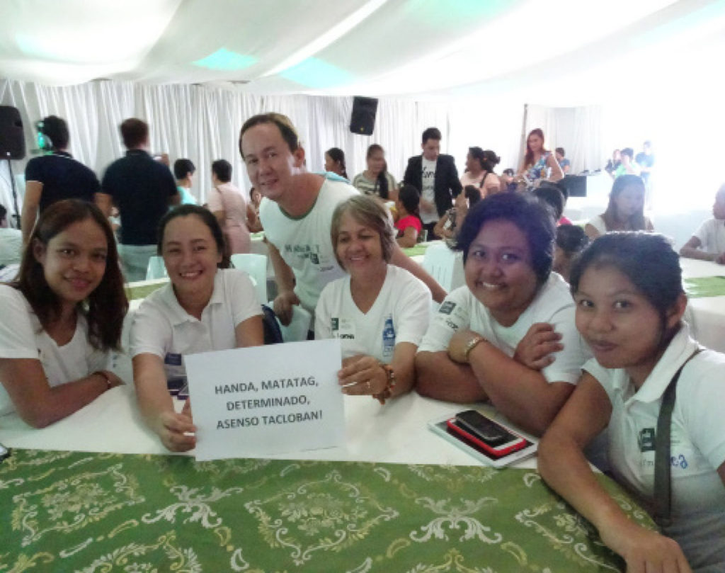  Women from coastal barangays of Tacloban City thanked Oxfam and Smart and PayMAYA for teaching them financial literacy and opportunity as a SMART loader.  							(Photo by Vicky Arnaiz)