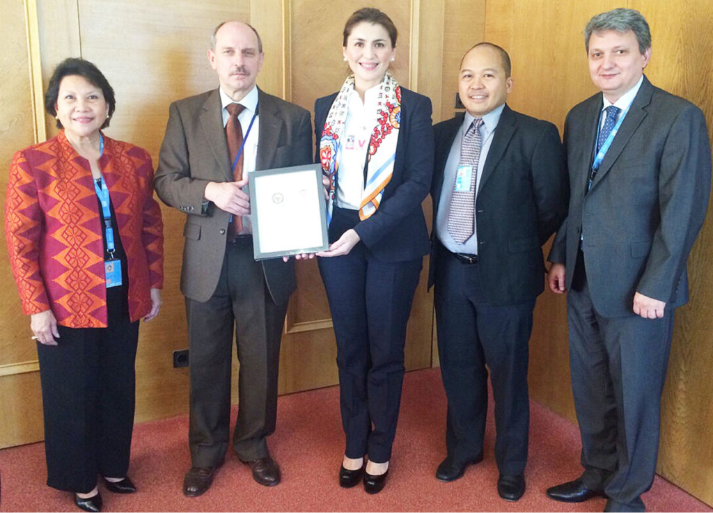 WORKING VISIT. Leyte (1st dist) Rep. Yedda Marie Romualdez (center) hand over a plaque of appreciation to United Nation Office for the Coordination of Humanitarian Affairs Deputy Director Rudolf Muller (2nd left) for helping the victims of super typhoon Yolanda,during her visit in Geneva Switzerland.Romualdez discussed to Muller her House Bill 344 An act creating the Department of Disaster Preparedness and Emergency Management.Also in photo are (from left) Ambassador Cecilia Rebong,Rolando Reario and Anvar Munnarov.  (VER NOVENO)