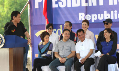 President Rodrigo Duterte jokes and asks Vice President Leni Robredo  if she has a boyfriend during his speech in the 3rd Year anniversary of Yolanda at the mass grave in Bgy Basper Tacloban City.Looking on are from left first row DENR Sec. Gina Lopez, DPWH Sec. Mark Villa,Leyte Gov. Leopoldo Petilla,(2nd row) left Presidential Assistant for the Visayas Mike Dino,former Leyte Rep. Martin Romualdez, Leyte (1st Dist) Rep. Yedda Marie Romualdez and DBM Sec.Ben Diokno.   photo by Ver Noveno