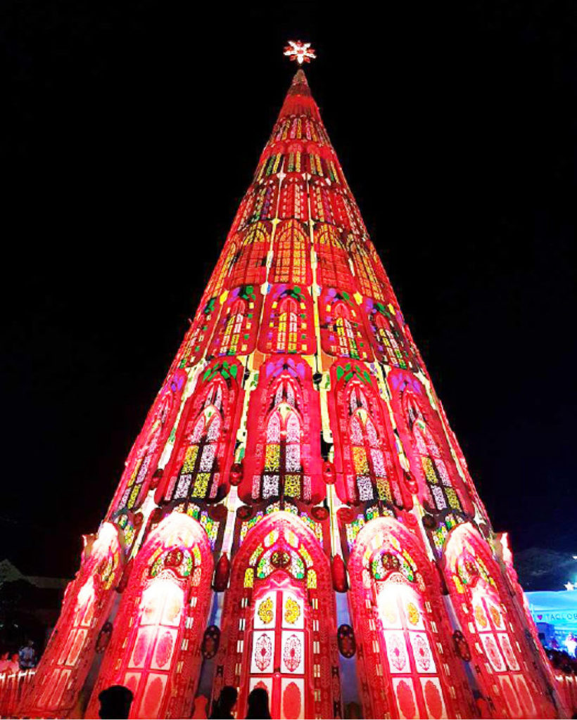 An 80 feet Christmas tree lights aglow after it was lighted up, ushering Christmas season in Tacloban City. Mayor Cristina Romualdez led the ceremonial lighting on December 7. The Christmas tree was designed after the classic cathedral window panes.( MEL CASPE)