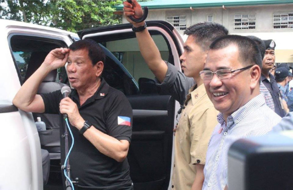 ASSURANCE.President Rodrigo Duterte assured the blast victims in Hilongos, Leyte that perpetrators will be hunted down and put them in jail. Mr. Duterte visited Hilongos on December 30 who was welcomed by local officials led by Leyte Governor Leopoldo Dominico Petilla. (MEL  CASPE)