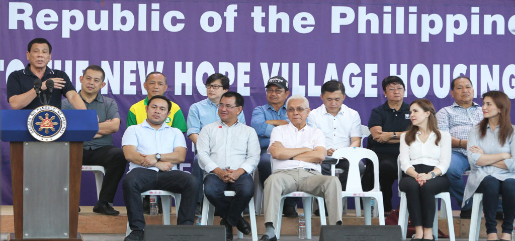 MARCH DEADLINE. President Rodrigo Duterte warned concerned government agencies to finish work on the resettlment housing projects for “Yolanda” survivors to finish on March or be “crucified.” Joining the President were several Cabinet secretaries,Tacloban City Mayor Cristina Romualdez, Leyte Gov. Leopoldo Dominico Petilla, Rep. Yedda Romualdez and husband, Ferdinand Martin Romualdez,president of the  Philippine Constitution Association President Martin Romualdez.  photo by Ver Noveno