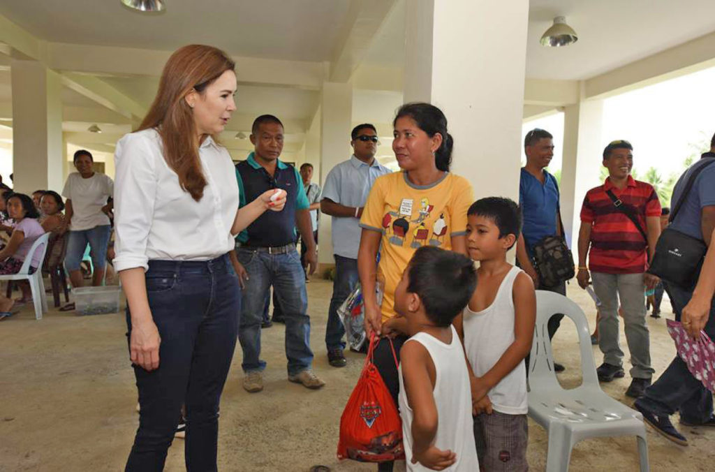 Tacloban City Mayor Cristina Romualdez talked with some residents living at the northern resettlement sites during the barangayan during which the city government offered free services to the people.